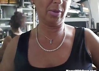 Busty mature opens her tight pussy